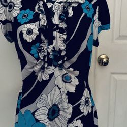 Fitted short sleeve top XL. Preowned in great condition. Comes from a smoke free environment. 