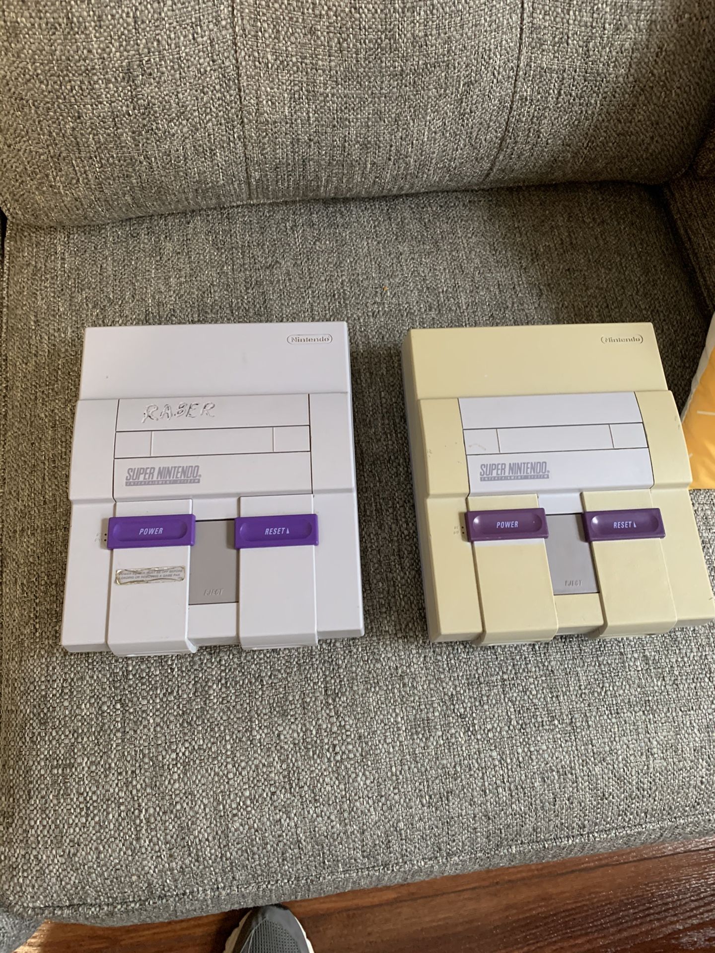 two super nintendo consoles snes