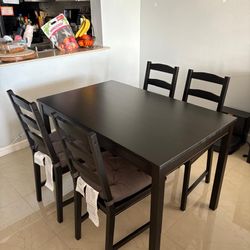 IKEA Hagernas Black Dining Table With 4 Chairs And Cushions