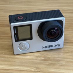 GoPro Hero 4 action camera with case and suction mount