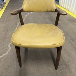 vintage mid-century modern Paoli "Cow Horn" arm chair with mustard yellow vinyl upholstery