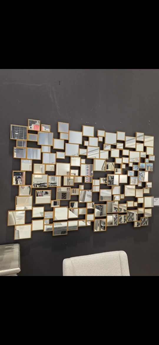 Unique Eccentric 50 Individual Mirrors Connected With Gold Trim.