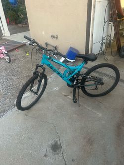 Huffy Trail Runner full-suspension mountain bike 24” model.