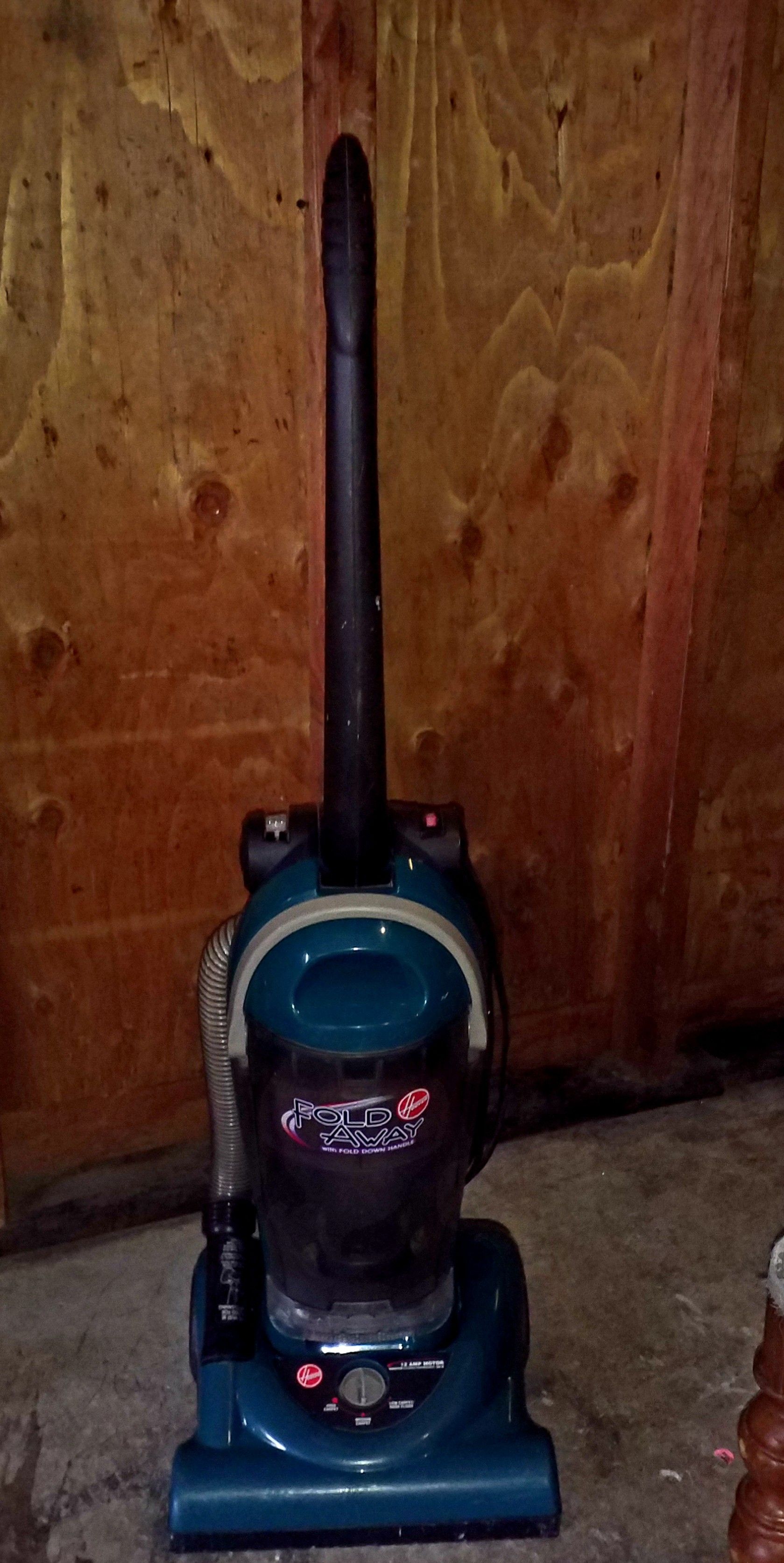 Hoover bagless upright vacuum cleaner with fold down handle for easy storage, $10 OBO