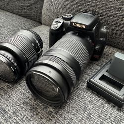 Canon Rebel XTi Digital Camera With Two Lenses And Two Batteries And Charger