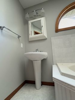 Bathroom Sink, Medicine Cabinet, Light Fixture, Toilet