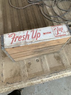Vintage 7up crate with old Pepsi and 7up bottles
