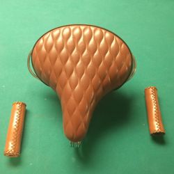 LEATHER SEAT AND HAND GRIPS.