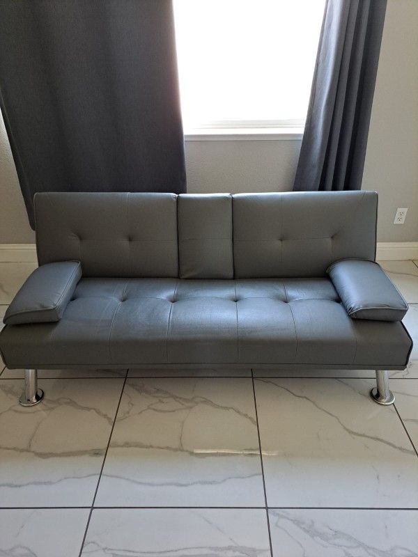 Modern Faux Leather Futon with Cupholders and Pillows