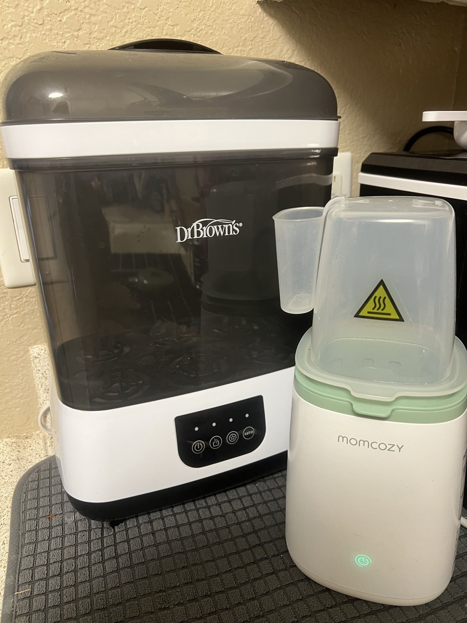 BOTTLE STERLIZER AND BABY BOTTLE WARMER