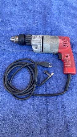 Look ! Nice Milwaukee 3/8” Hammer/Drill . Deal !