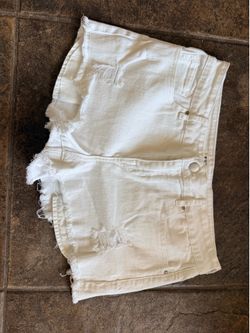 Never worn white distressed shorts