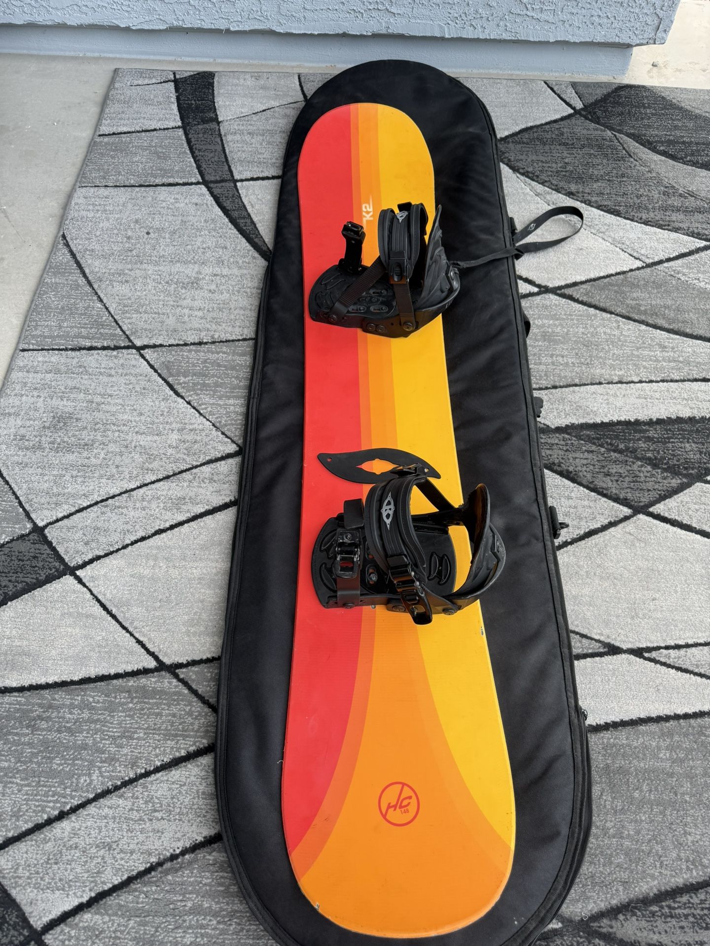 K2 Snowboard with Bindings + Travel Bag
