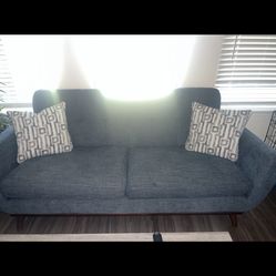 Blue Couch with Pillows