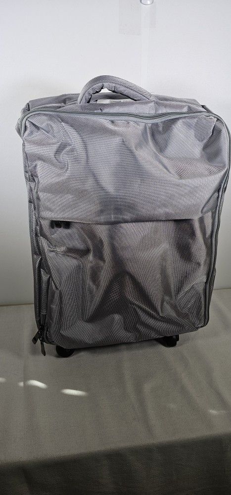 New With Tags - Lipault Large Soft Carry-On Luggage. Color Gray.