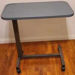 Adjustable over bed bedside table