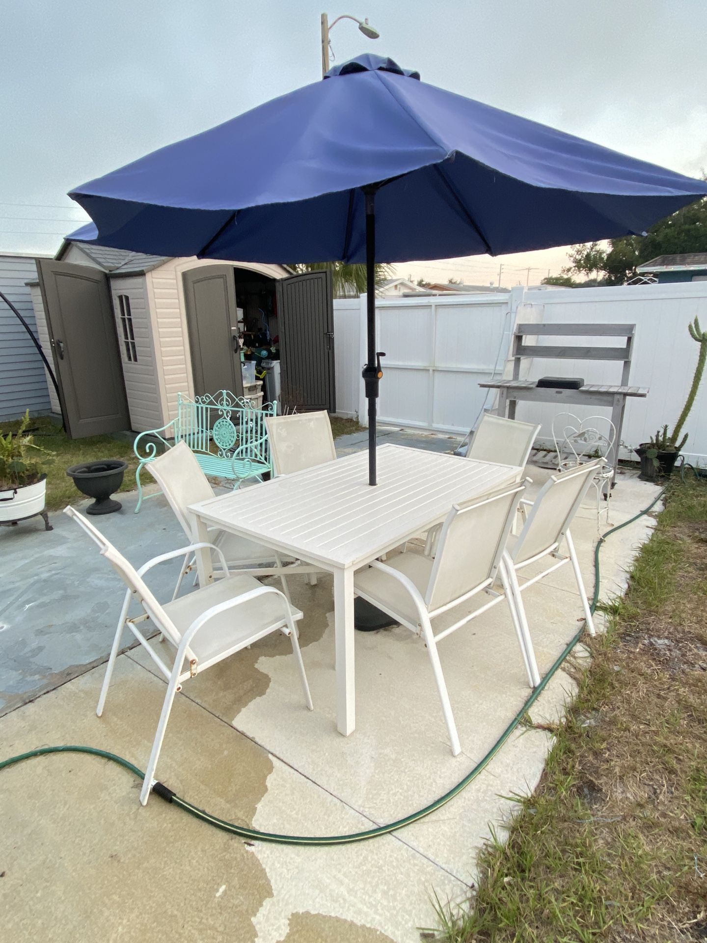 White Table And 6 Chairs With Umbrella And Stand