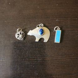Three 925 Sterling Silver Charms