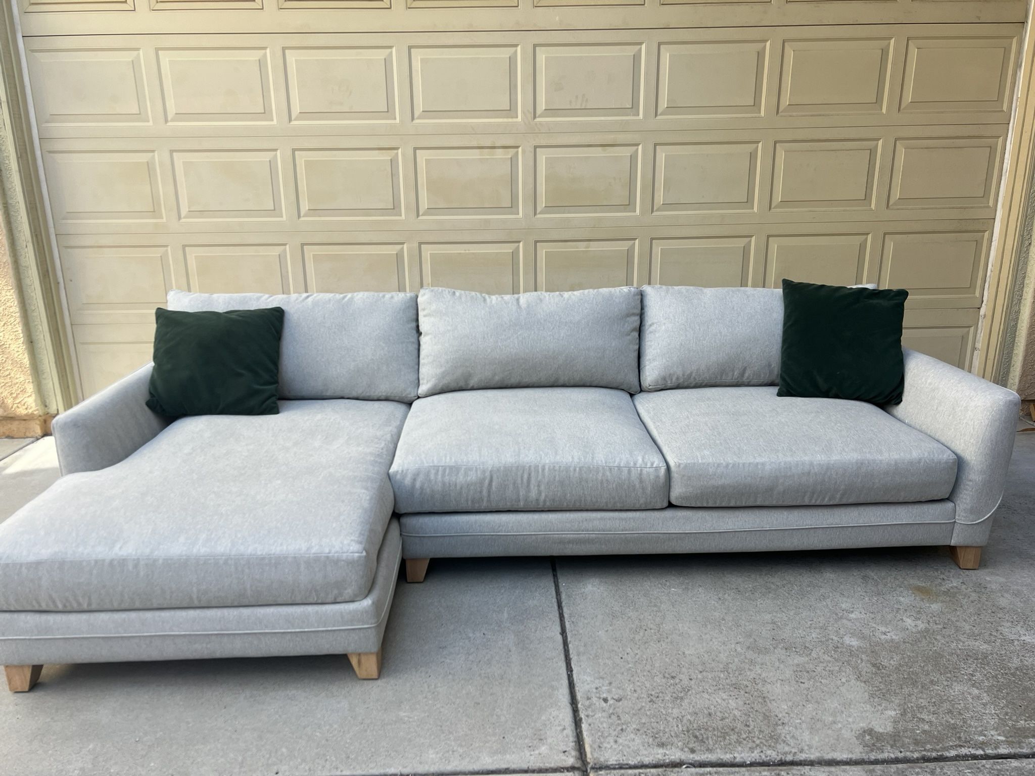 Living Spaces gray sectional sofa couch with left facing chaise