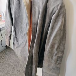 Jordache woman's blue suede leather coat, size medium