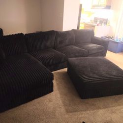 Black Sectional And Ottoman