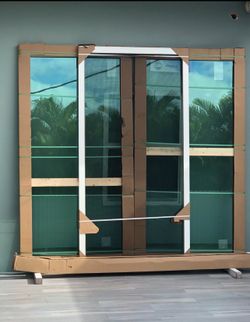 CGI 96 X 96 Hurricane Impact Sliding Glass Door ( a PGT Co.)