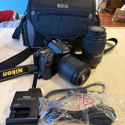 Nikon D7000 With AF-S Nikkor 18-105mm And AF-S Nikkor 55-300m Lens