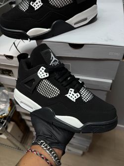 Air Jordan 4 Black and White Sneakers