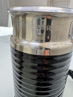 Coffee pod holder and milk frother