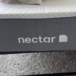 Twin sized Nectar mattress with frame