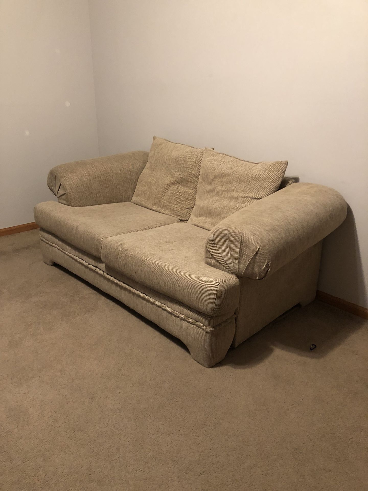 Tan loveseat