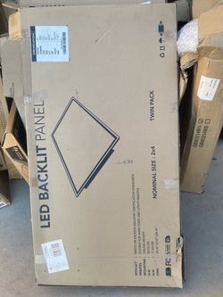 a cardboard box for a Twin Pack LED Backlit Panel measuring 2'x4' nominal size, with 40W power, 5000 lumens, 4000K color temperature, and 120-277V vol