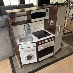 Kids play kitchen and taco cart