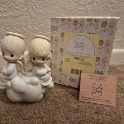 Precious Moments Love Goes On