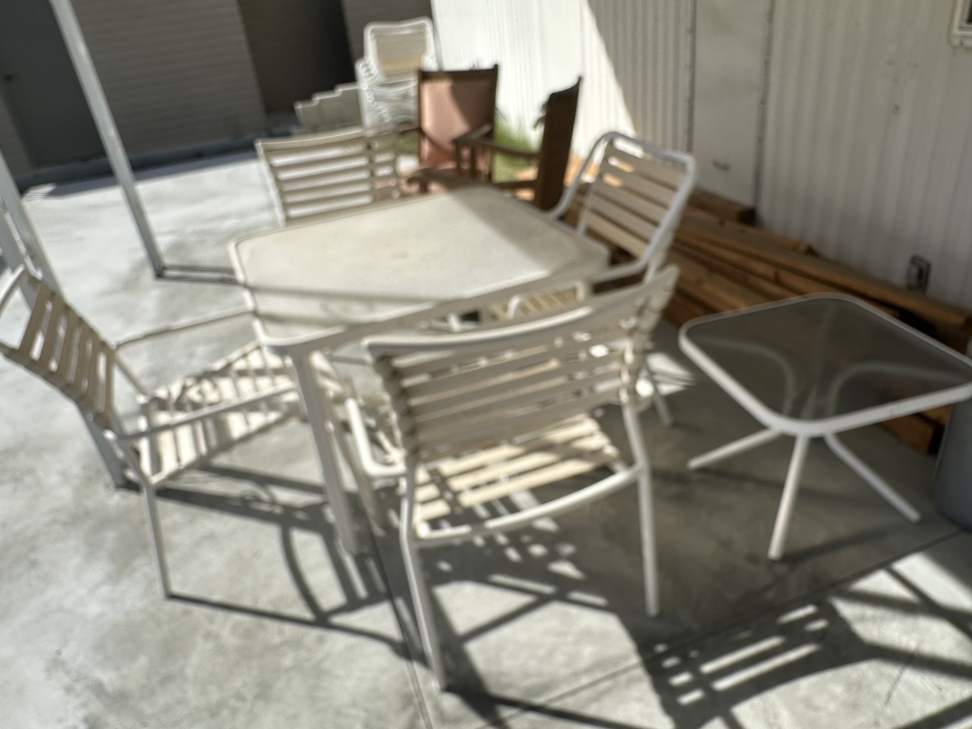 Patio dining set 4 dining chair, 1 lounger chair, 2 small round and one square glass top end tables