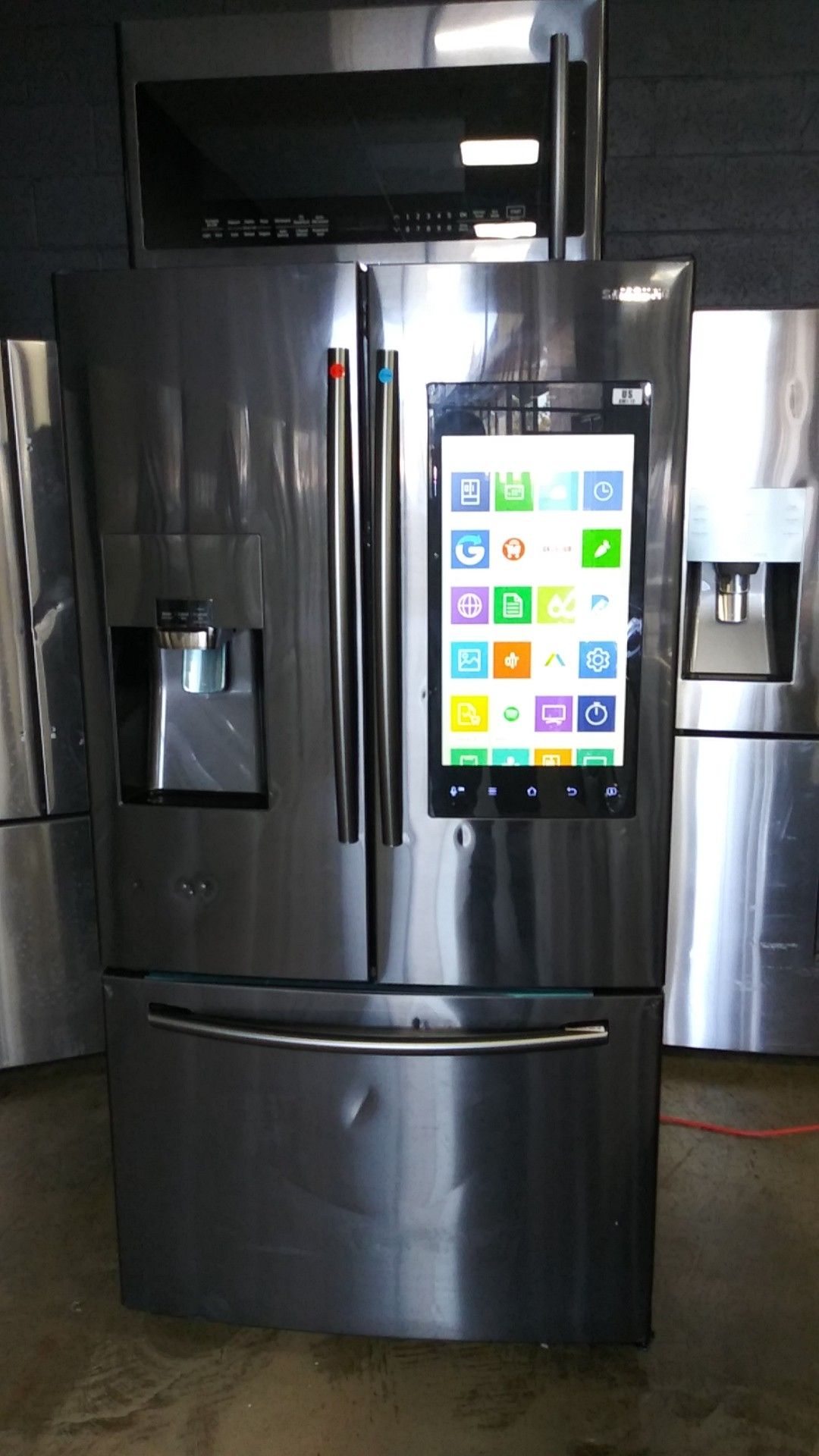 Samsung RF265BEAESR/AA 24 cu. ft. 3 -Door French Door Refrigerator with Family Hubâ„¢ - Stainless Steel