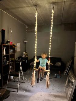 Luxurious handmade wooden swing with LED lights