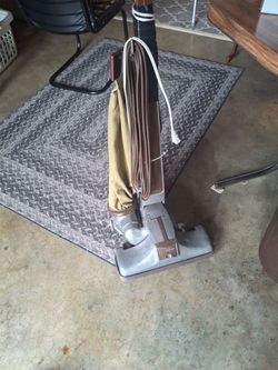 '70s Kirby vacuum with every attachment you can think of