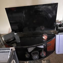 Vizio Tv With Entertainment Stand.  