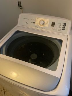 Insignia Top Load Washing Machine washer and dryer