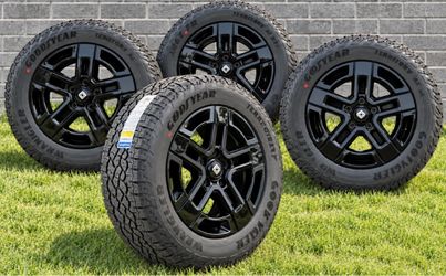20” Rivian gloss black wheels and tire