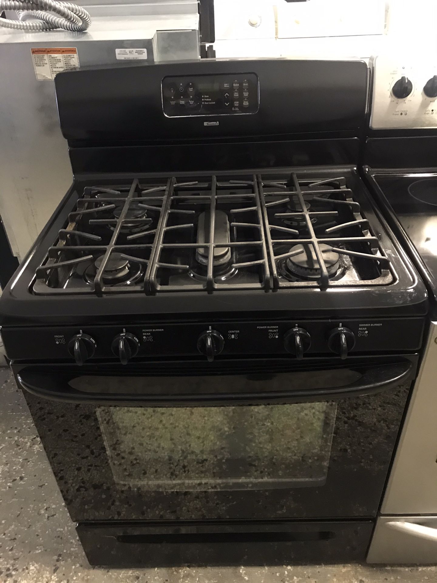 Kenmore brand refurbished 5 burner gas stove works great with warranty.