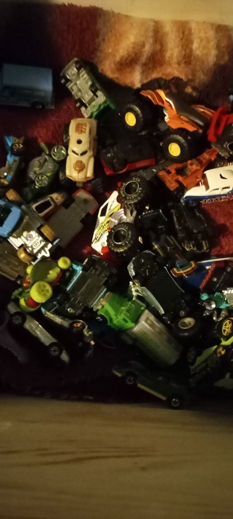 Match Box Cars And Large Toy Vehicles And Bunch Of Homemade Wooden Ones