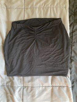 Black mini skirt with ruched detail
