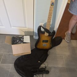 Guitar Amplifier And Case 