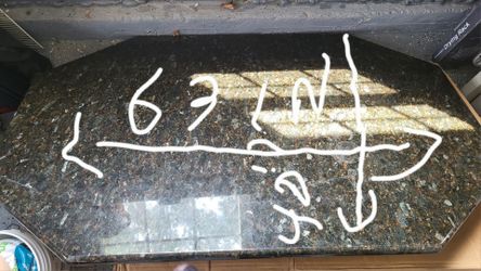 Durable granite island countertop piece.