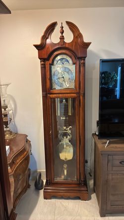Grandfather clock and entertainment center