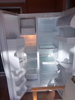 Kenmore coldspot side by side Refrigerator - Model 106.(contact info removed)1