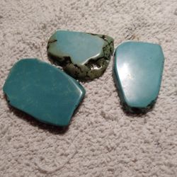 3 REAL NICE PEICES OF TURQUOISE. 1 1/2. X. 2"  CLOSE. TO  SIZE     200.00 ALL 3 PEICES