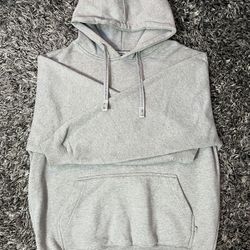 This is a Pro Club Men's Heavyweight Pullover Hoodie in heather grey